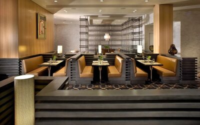 Dining area with comfortable seating, perfect for co-working at EB Hotel Miami.