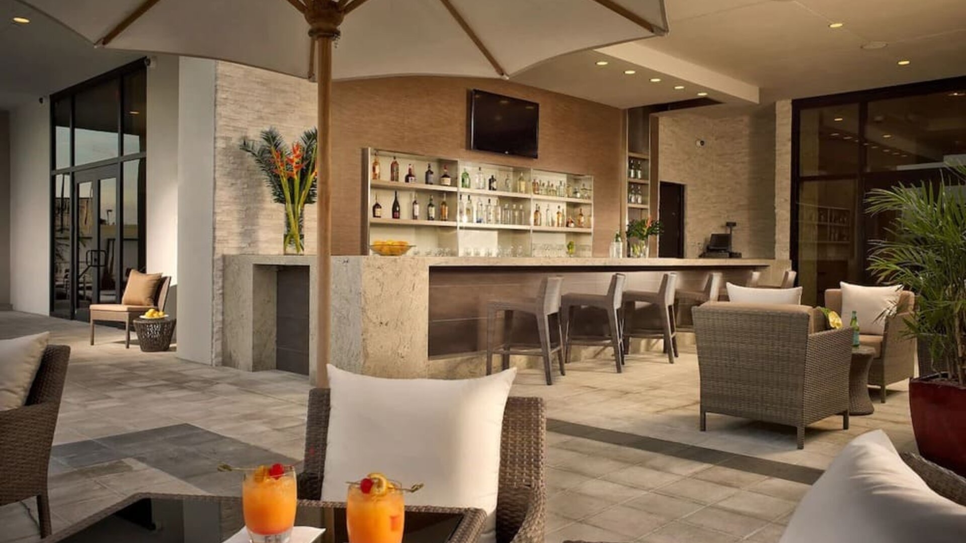 Hotel bar at the terrace with comfortable seating at EB Hotel Miami.