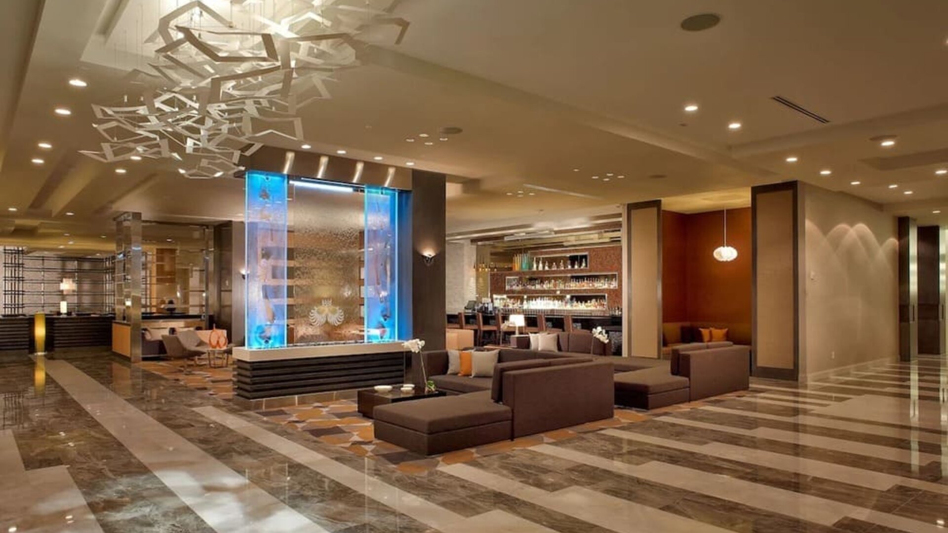 Hotel lobby with lounge seating at EB Hotel Miami. 