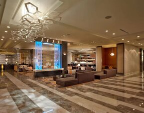 Hotel lobby with lounge seating at EB Hotel Miami. 