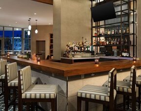 On-site bar and lounge area at Hyatt Centric Brickell Miami.