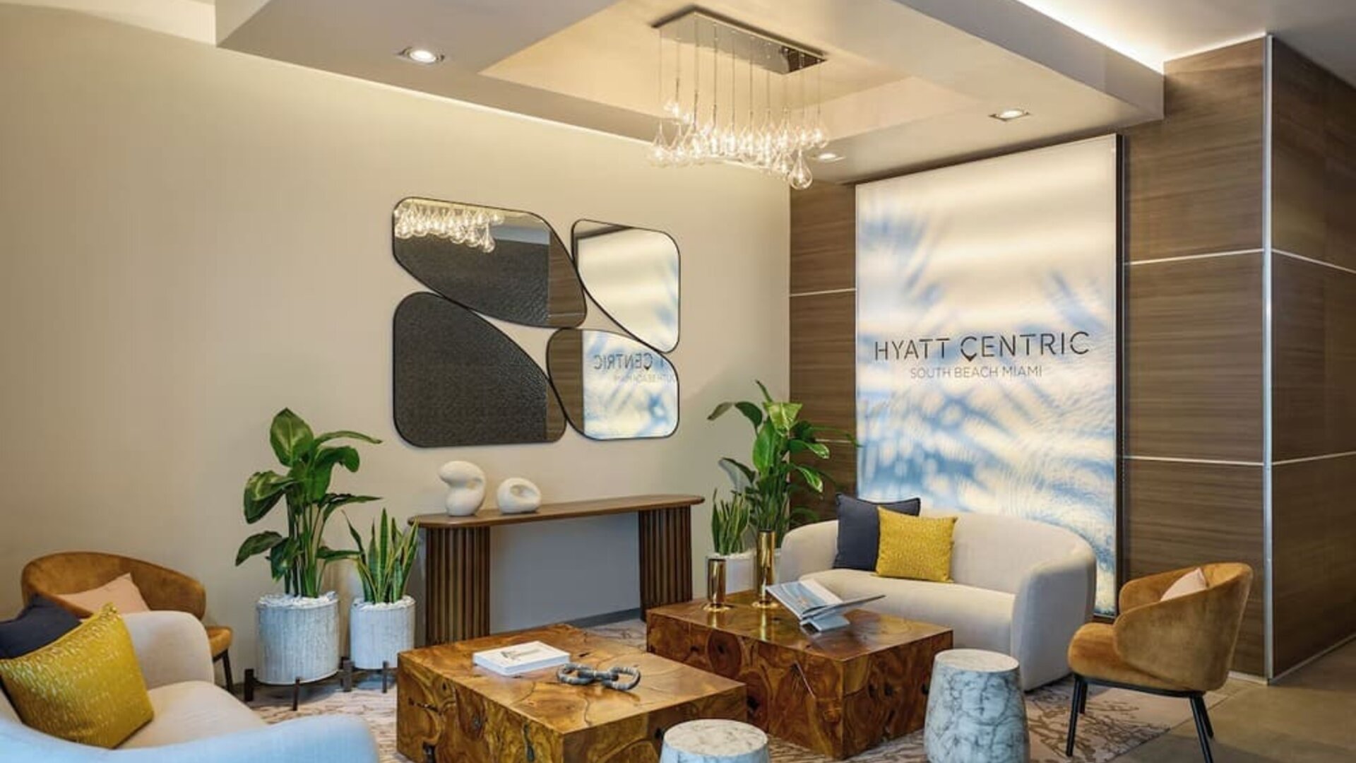Reception with lounge seating, perfect for co-working at Hyatt Centric Miami South Beach.