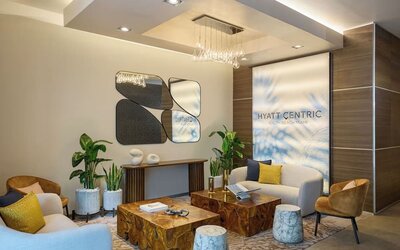 Reception with lounge seating, perfect for co-working at Hyatt Centric Miami South Beach.