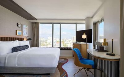 Day use room with king bed, work desk and private bathroom at Hyatt Centric Miami South Beach.