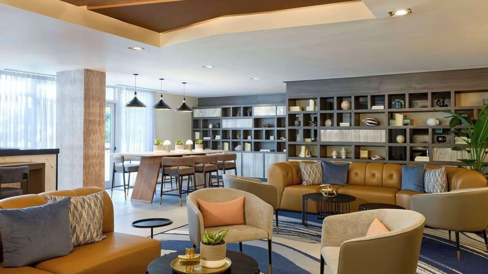 Lounge area and workspace with comfortable seating, perfect for co-working at Hyatt Centric Miami South Beach.