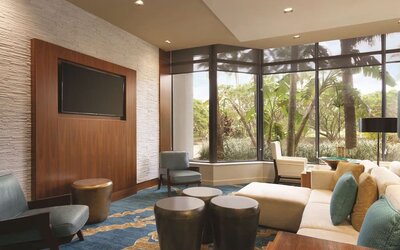 Lounge seating at Hilton Miami Airport Blue Lagoon.