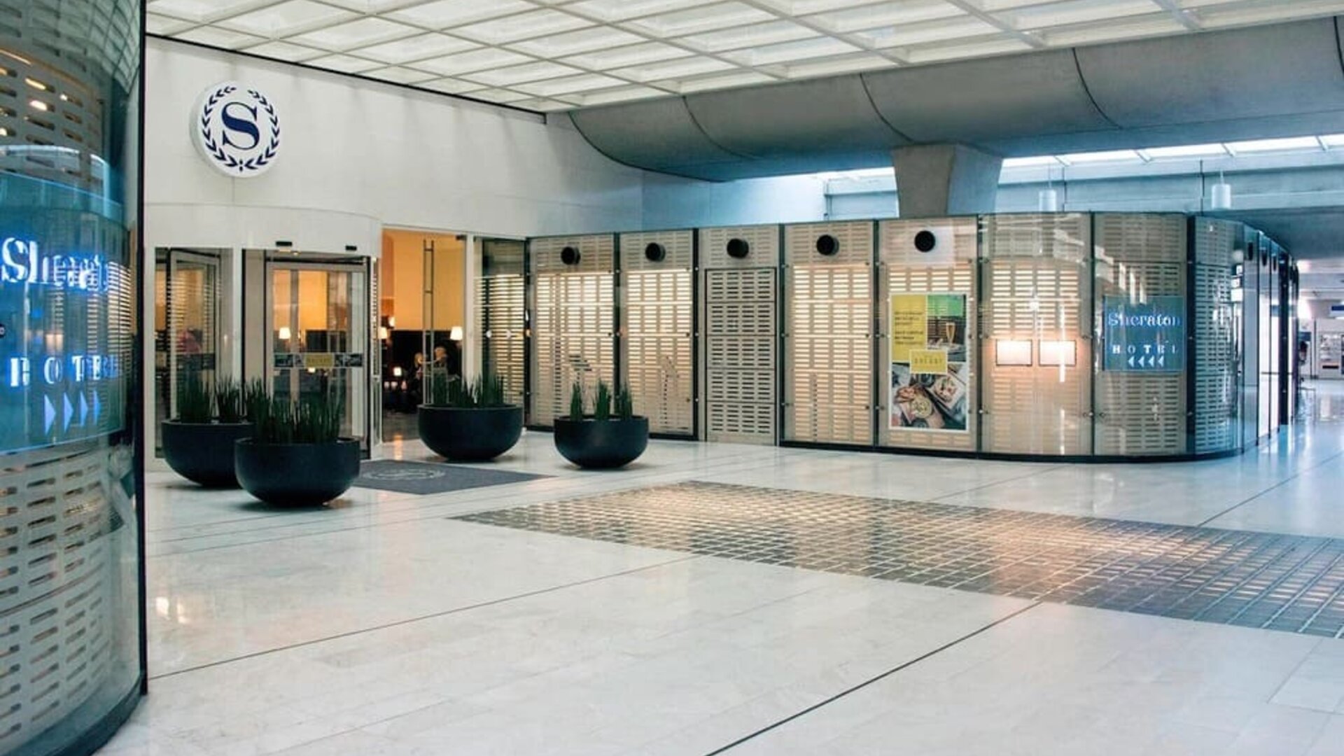 Reception hall at Sheraton Paris Charles De Gaulle Airport Hotel.