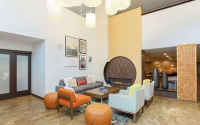 Lobby seating at Hampton Inn & Suites Denver Tech Center.