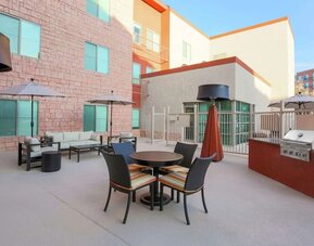 Outdoor terrace seating at Hampton Inn & Suites Denver Tech Center.