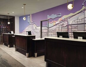 Reception desk at Homewood Suites By Hilton Chicago Downtown/Magnificent Mile.
