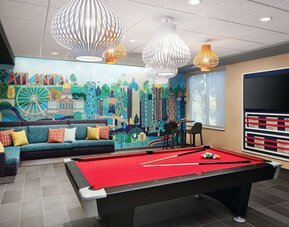 Game room at Tru By Hilton Atlanta Northlake Parkway.