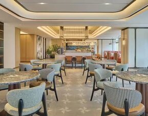 Dining room at Hilton Garden Inn Chongqing Yubei Central Park.