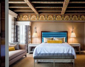 Day use room with sofa and natural light at Courtyard San Diego Downtown.