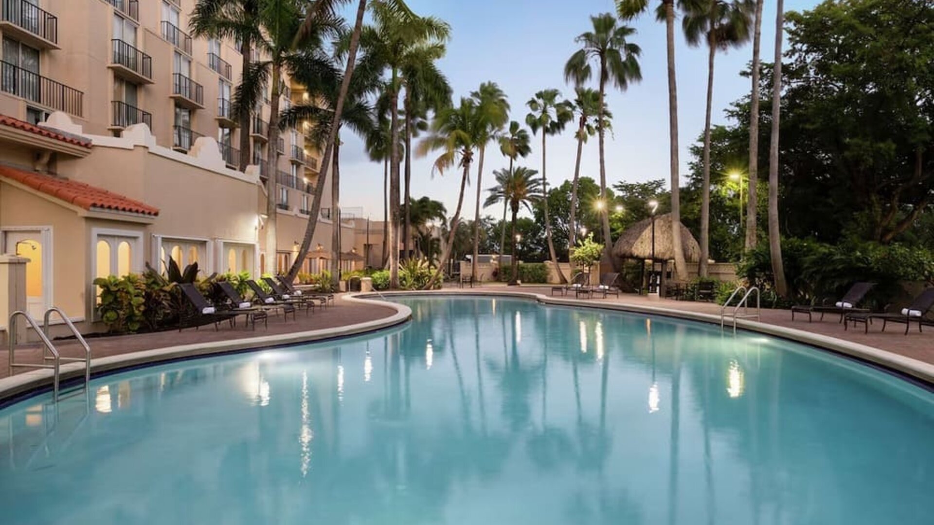 Outdoor pool at Embassy Suites By Hilton Miami - International Airport.