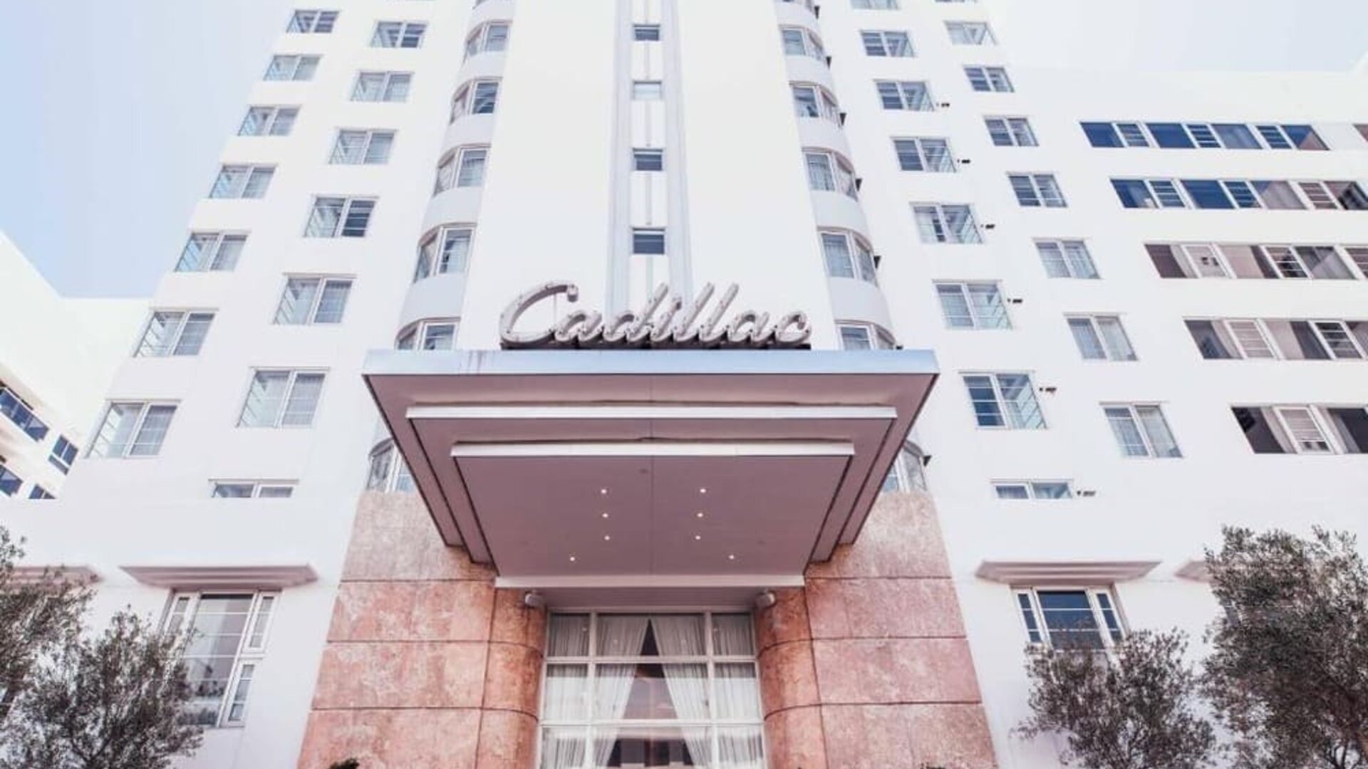 Entrance and outdoor view of Cadillac Hotel & Beach Club, Autograph Collection.