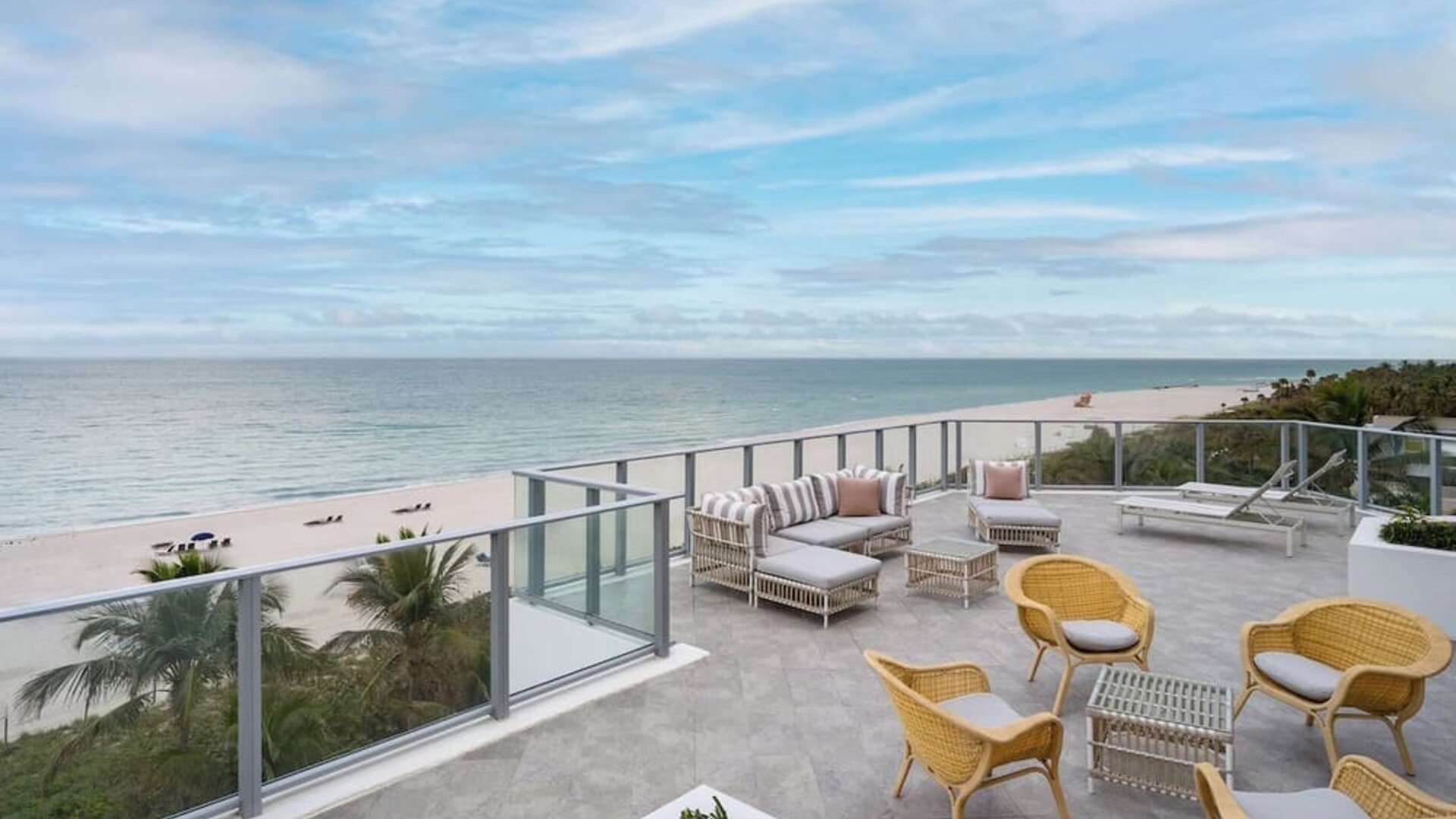 Terrace lounge seating with beautiful view at Cadillac Hotel & Beach Club, Autograph Collection.