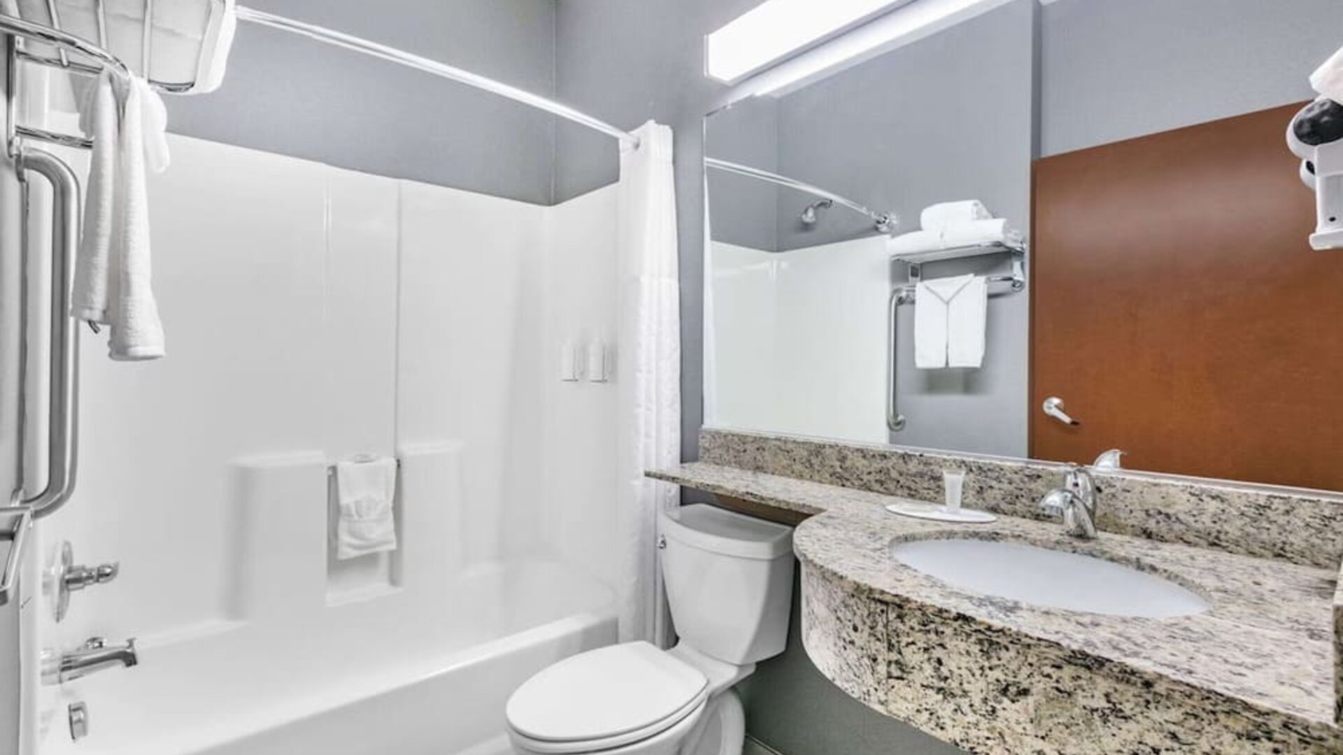 Guest bathroom at Microtel Inn And Suites By Wyndham Austin Airport.