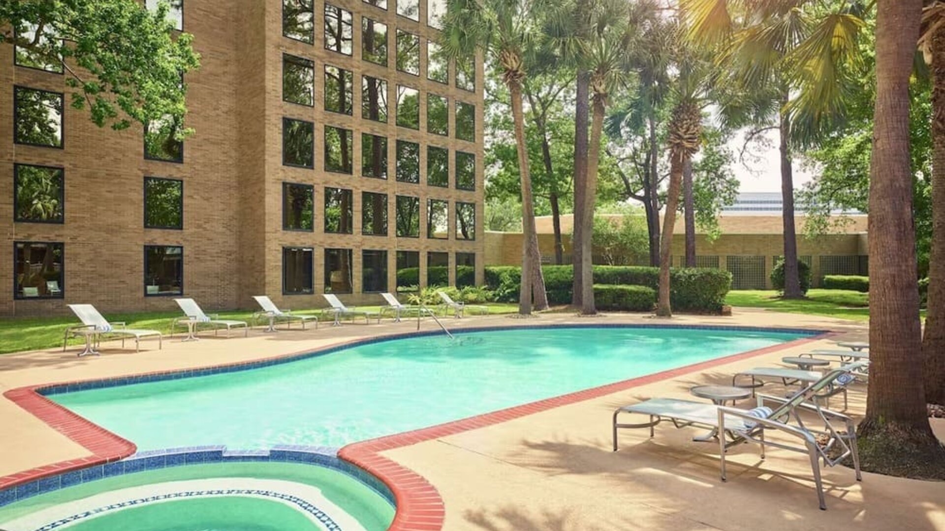 Outdoor pool at DoubleTree By Hilton Houston Intercontinental Airport.
