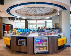 Reception and snack bar at Tru By Hilton Eugene.