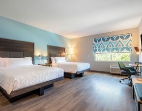 Day use room with TV and work desk at Tru By Hilton Eugene.