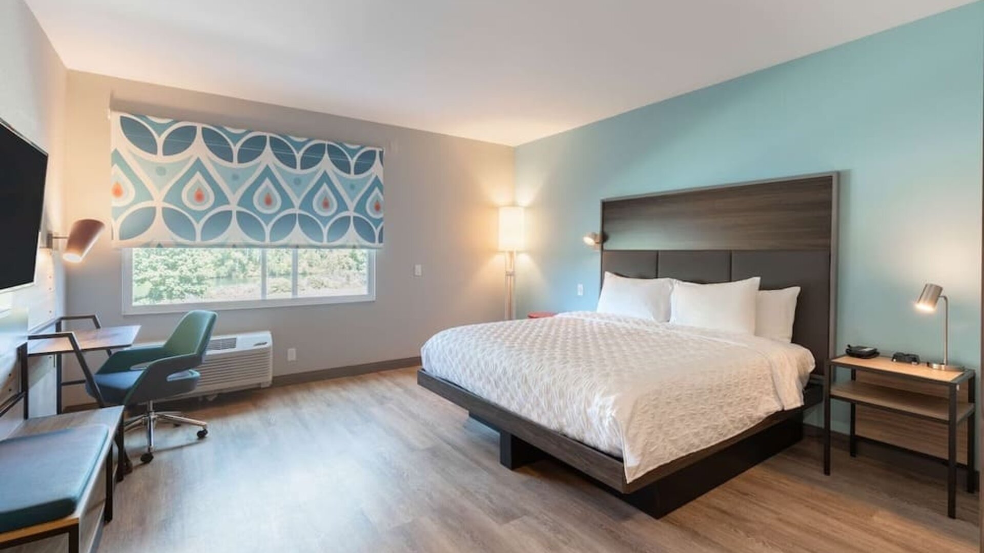 Day use room with TV and work desk at Tru By Hilton Eugene.