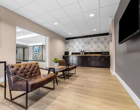 Lobby and coworking space at Suburban Studios Orlando - Ocoee/Winter Garden.