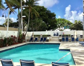Outdoor pool at GALLERYone - A DoubleTree Suites By Hilton Hotel.