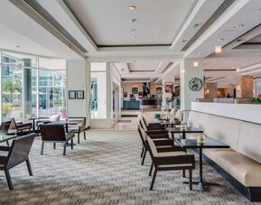 Hotel bar at GALLERYone - A DoubleTree Suites By Hilton Hotel.