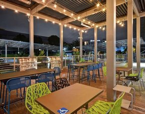 Outdoor seating at Home2 Suites By Hilton San Francisco Airport North.