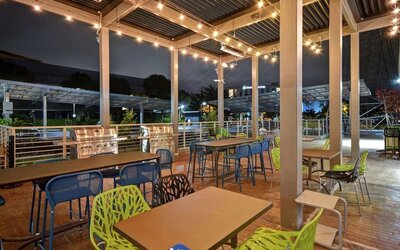 Outdoor seating at Home2 Suites By Hilton San Francisco Airport North.