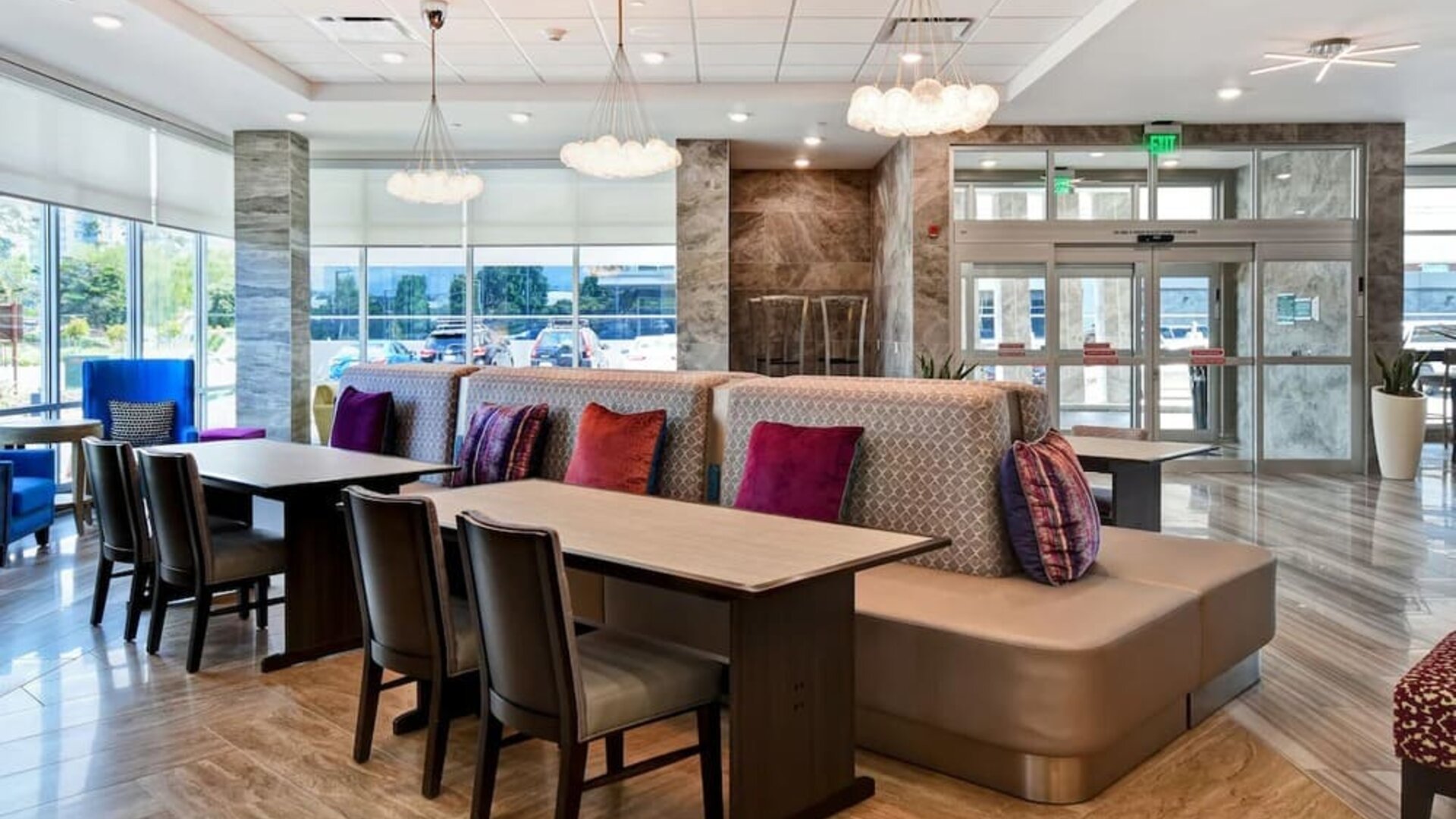 Coworking space and lounge at Home2 Suites By Hilton San Francisco Airport North.