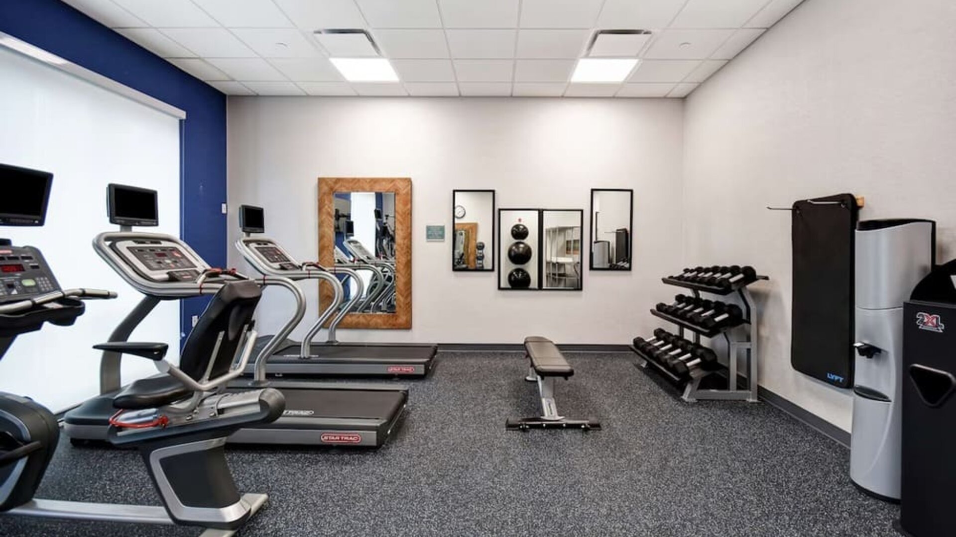 Gym at Home2 Suites By Hilton San Francisco Airport North.