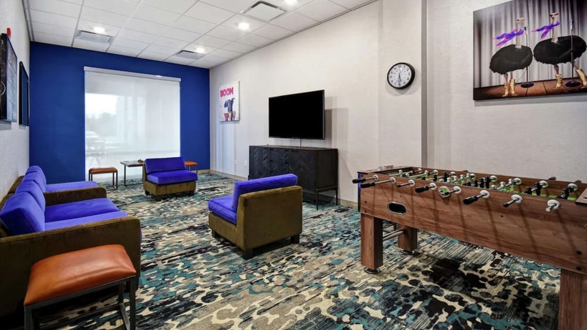 Coworking space and lounge at Home2 Suites By Hilton San Francisco Airport North.