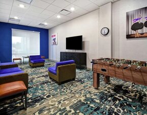 Coworking space and lounge at Home2 Suites By Hilton San Francisco Airport North.