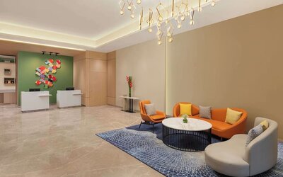Lobby seating at Hilton Garden Inn Surat City Centre.