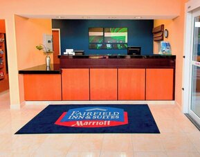 Reception desk at Fairfield Inn & Suites Joliet North/Plainfield.