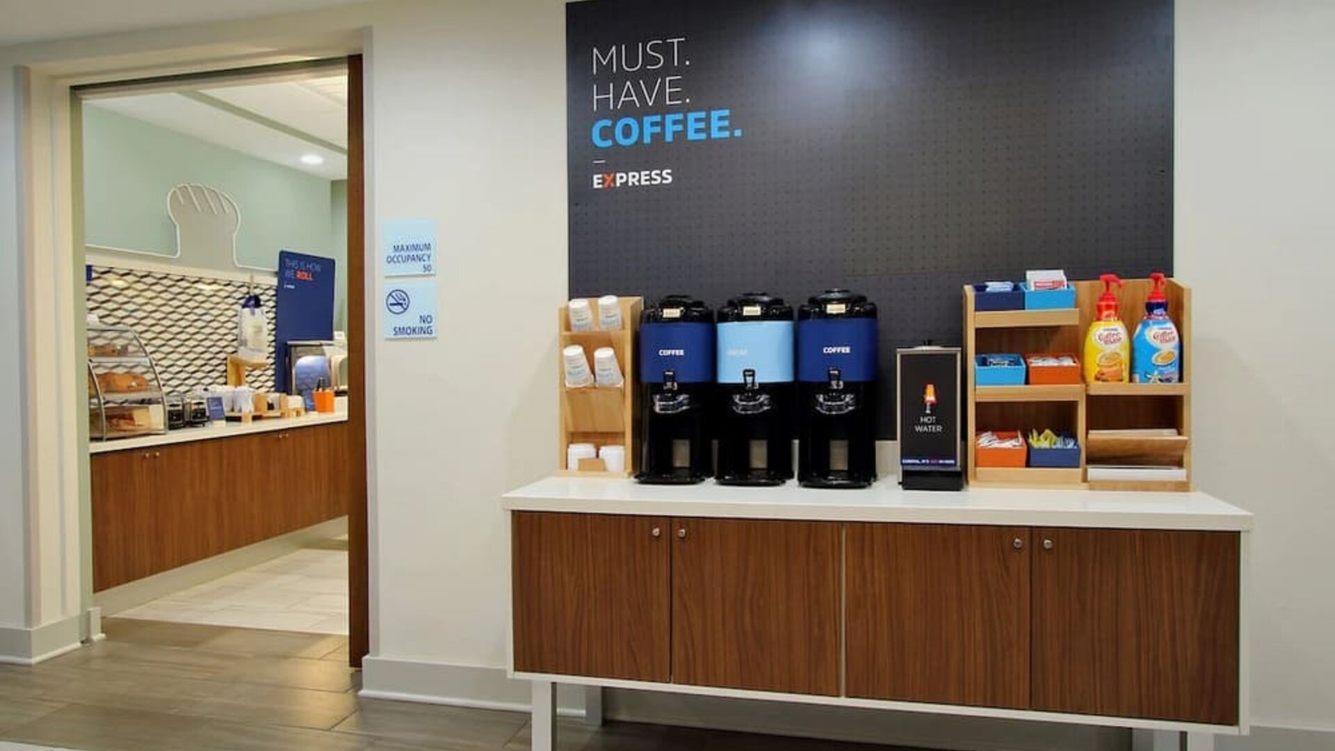 Coffee station at Holiday Inn Express Hotel & Suites Carlsbad Beach.
