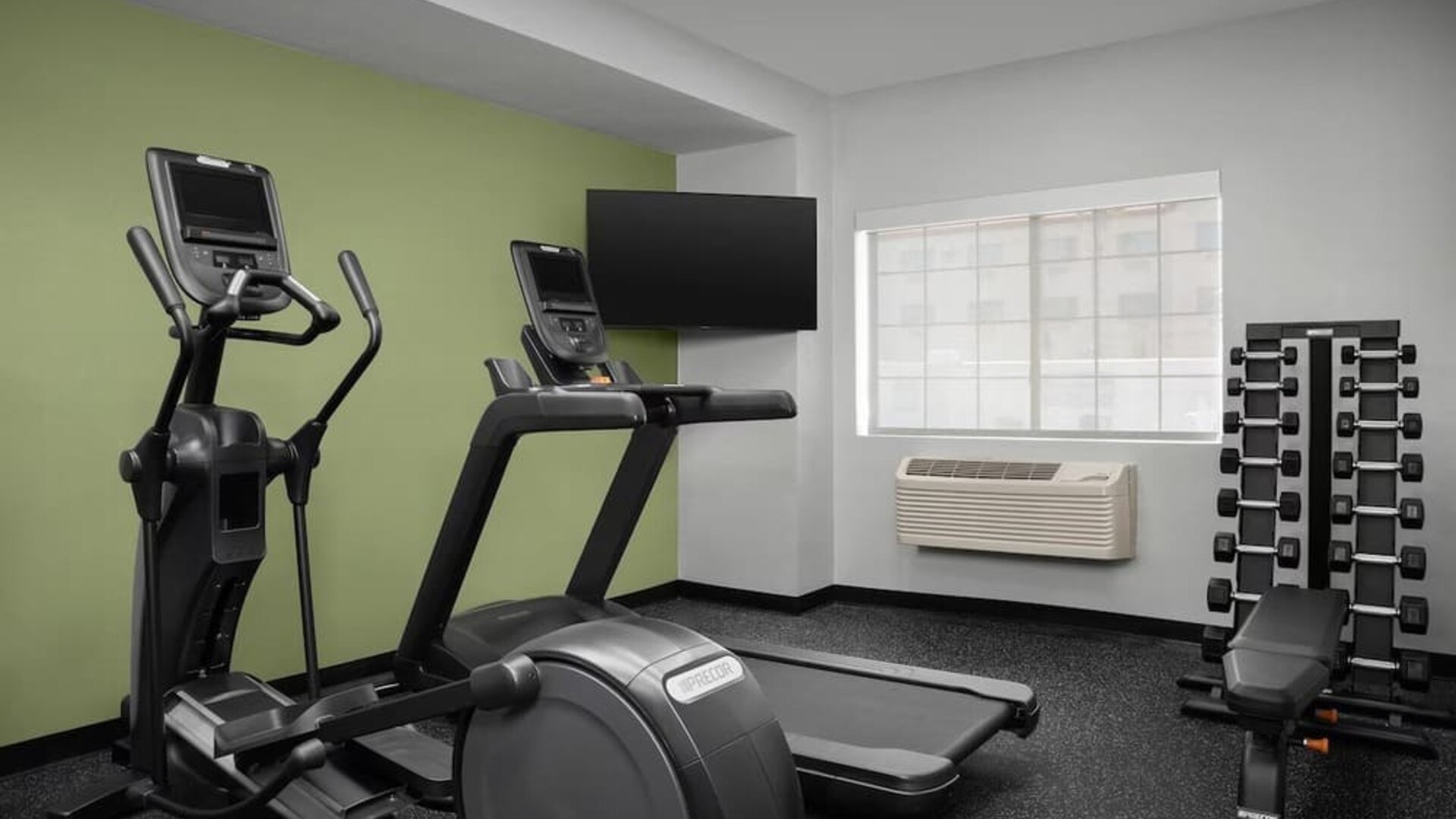 Fitness center at Spark By Hilton Tucson Airport.