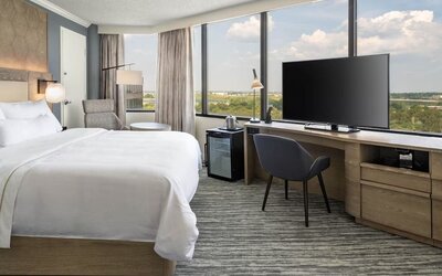 Double bed guest room with panoramic views at Westin Atlanta Airport Hotel.