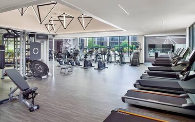 Fully equipped fitness center at Atlanta Marriott Northwest At Galleria.