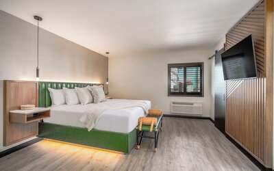 Day use room with TV and natural light at LYFE INN & SUITES By AGA.