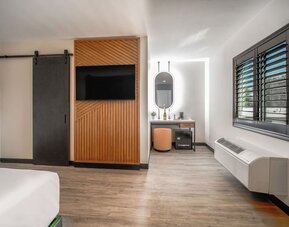 Day use room with TV and natural light at LYFE INN & SUITES By AGA.