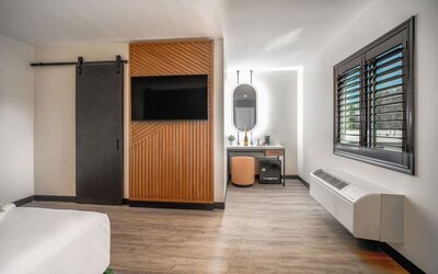 Day use room with TV and natural light at LYFE INN & SUITES By AGA.