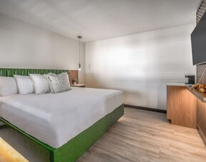 Day use room with TV and natural light at LYFE INN & SUITES By AGA.