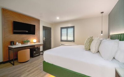 Day use room with TV and natural light at LYFE INN & SUITES By AGA.