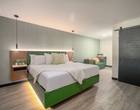 Day use room with TV and natural light at LYFE INN & SUITES By AGA.