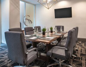 Meeting room at Embassy Suites by Hilton San Francisco Airport.