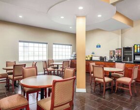 Dining room at Days Inn By Wyndham San Antonio Near Fiesta Park.
