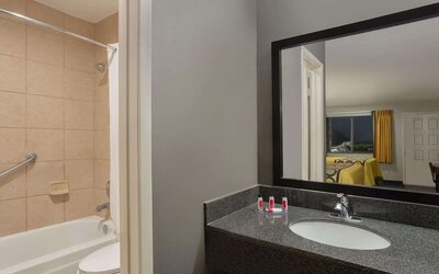 Guest bathroom at Super 8 By Wyndham Universal City.