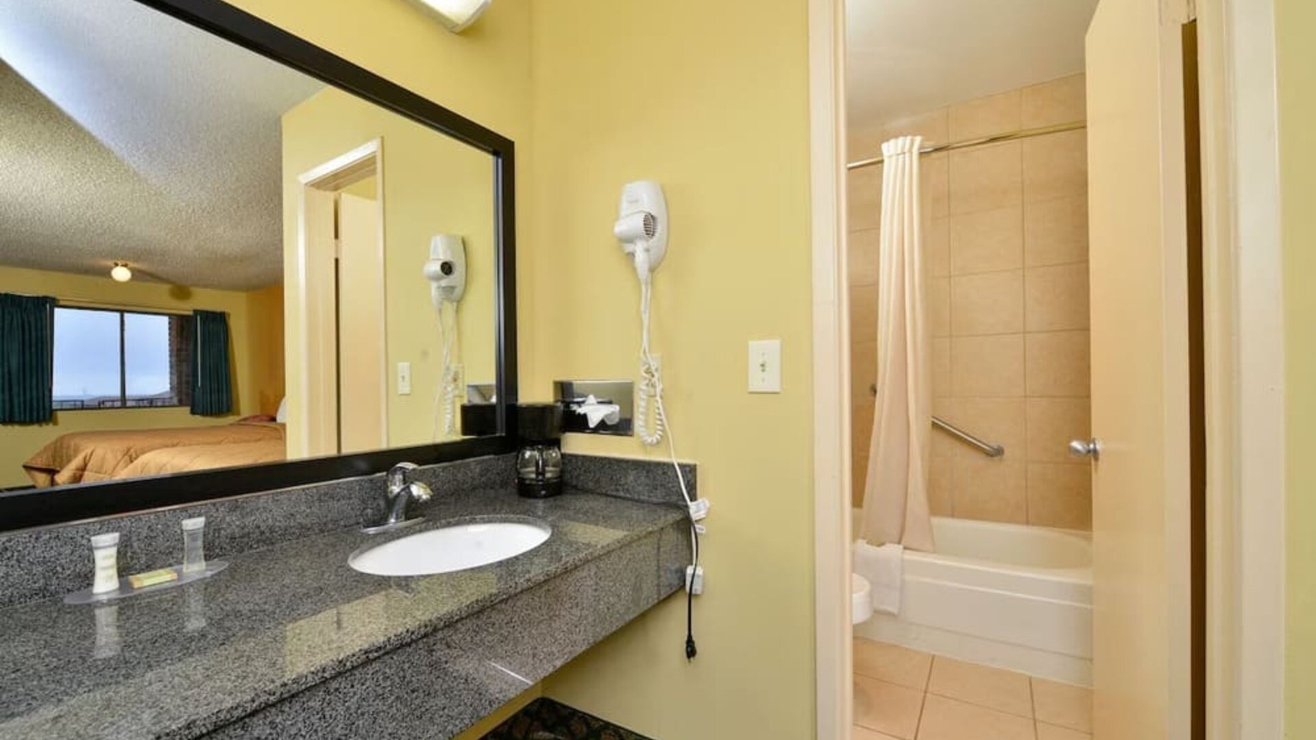 Guest bathroom at Super 8 By Wyndham Universal City.